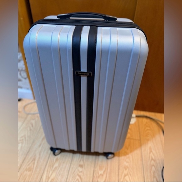 Samsonite 26” Gray and Black Rolling Suitcase